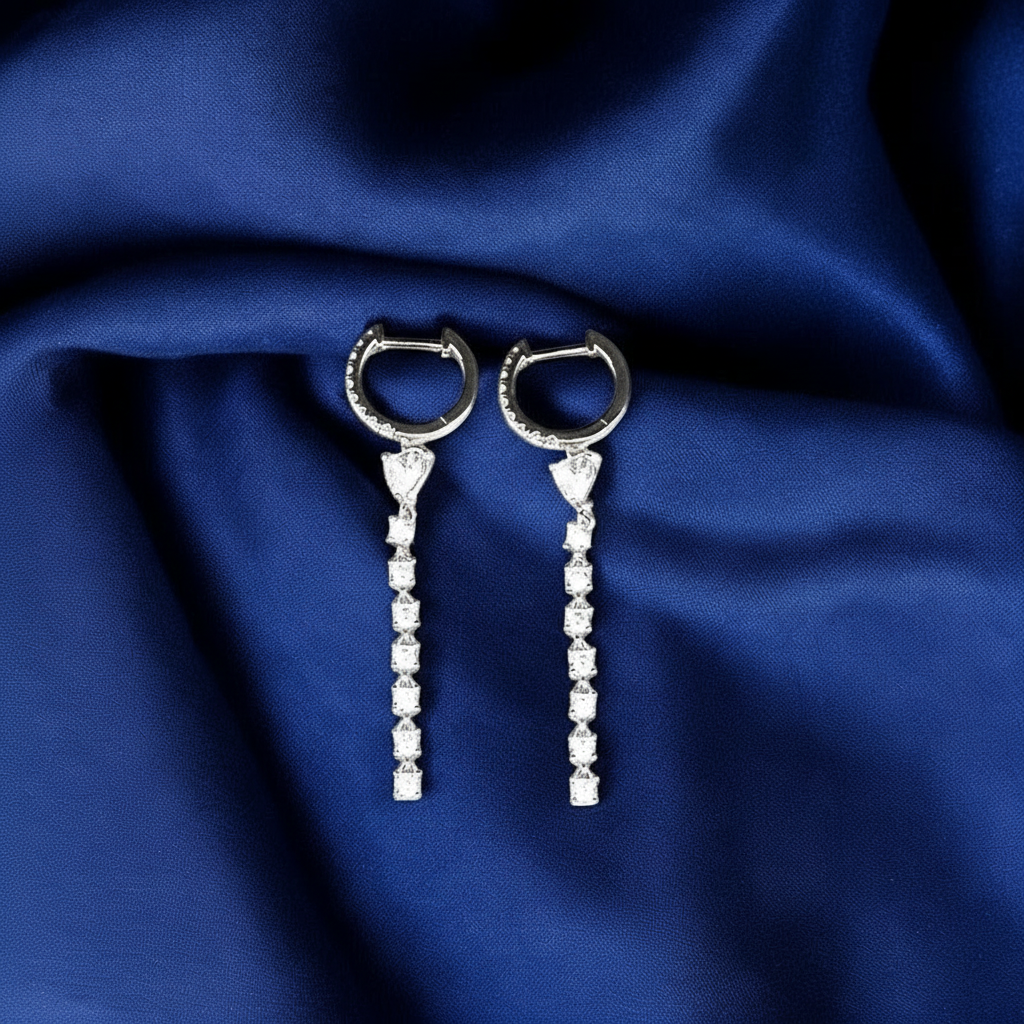 Pair of Silver Heartfelt Hoop Earrings with CZ diamond-like stones