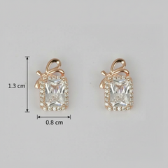 Pair of 925 Sterling Rosegold Bow Emerald Cut Studs