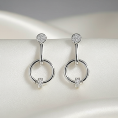 Silver hoop earrings with small diamonds