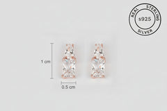 Rose gold earrings with AAA+ cunic zircons on a white background, labeled as 'Real Sterling Silver S925'.