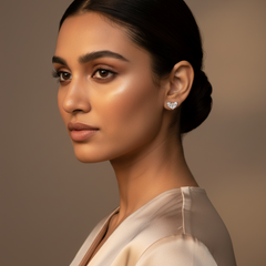 Woman wearing 925 Sterling Silver Graceful Wings Studs