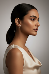 Woman wearing 925 Sterling Silver Blue Hoops