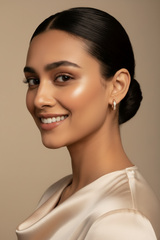 Woman wearing 925 Sterling Silver Rosegold Mini Hoops