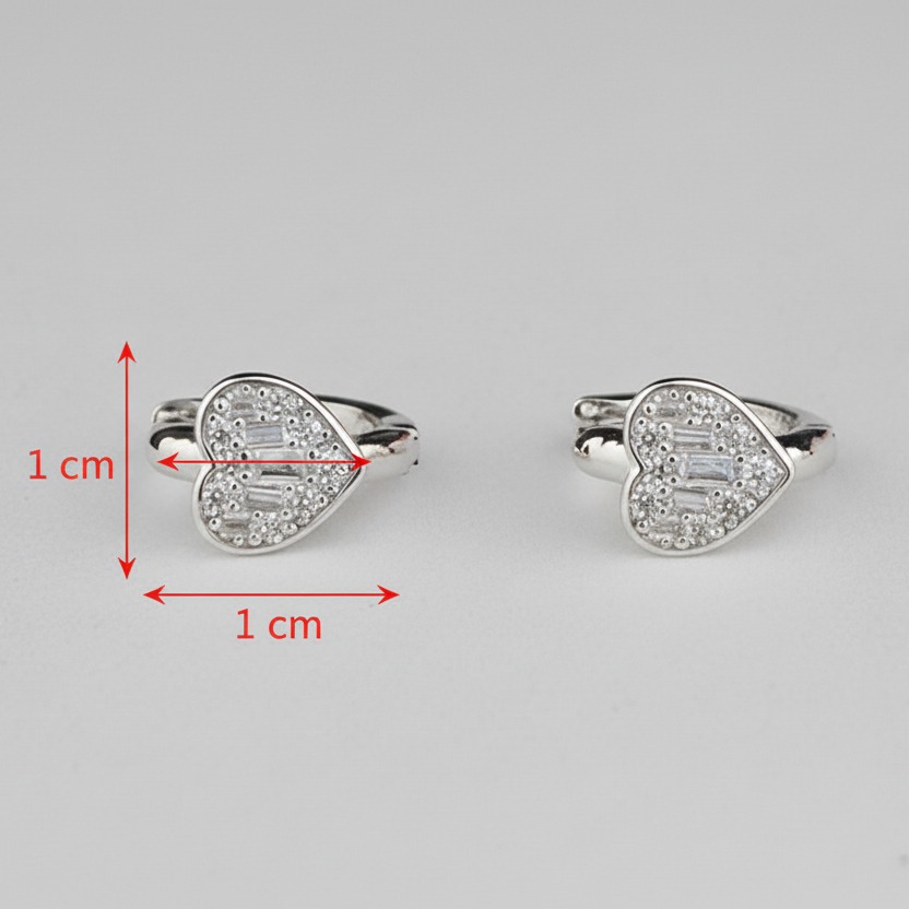 Heart-shaped silver rings with diamond accents on a gray background, showing measurements.
