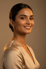 Woman wearing a 925 Sterling Silver pink hoop earrings