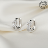 925 Sterling Silver Infinity Zircon Hoop Earrings featuring 'Real Sterling Silver' label.