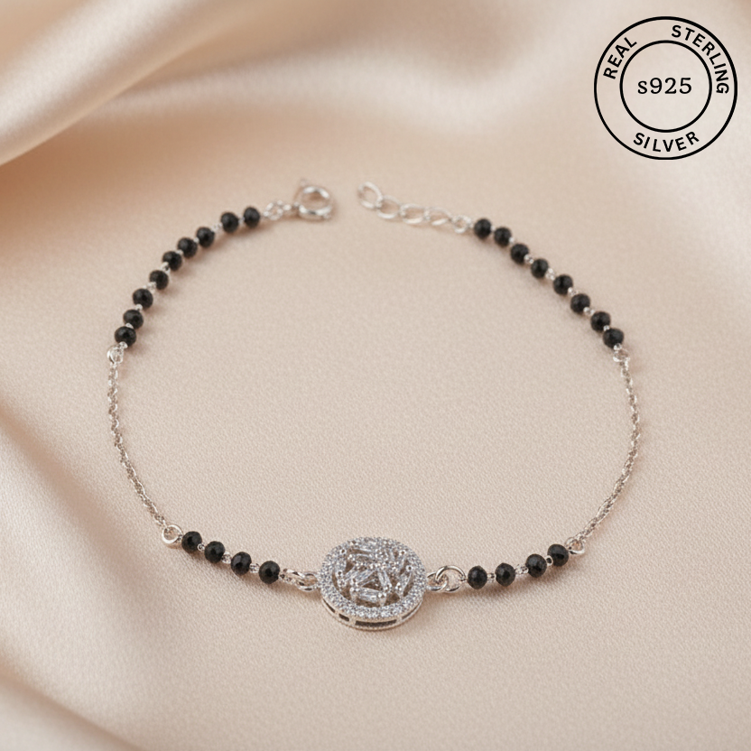 925 Sterling Silver Black Bead Halo Bracelet with black beads on a beige fabric background, featuring 'Real Sterling S925' label.