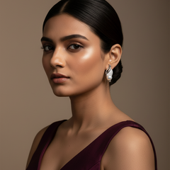 Woman wearing a deep purple dress and Silver Sea Shell Pearl Studs