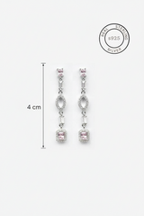 Silver earrings with pink gemstones and '925 Sterling Silver' stamp on a white background