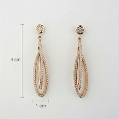 Rose gold earrings with diamond accents, shown with measurements