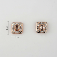 Pair of rose gold square earrings with gemstones