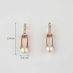 Rose gold earrings with pearls and diamonds, shown with measurements