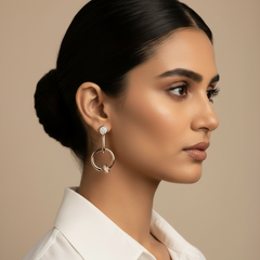 Woman wearing 925 Sterling Silver rosegold earrings