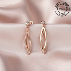 Rose gold earrings with zircon stones , featuring a 'Real Sterling Silver 925' stamp.