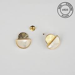 Gold and white earrings with 'Real Sterling Silver 925' stamp.