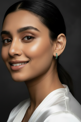 woman wearing 925 sterling silver hoop earring