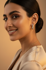 Woman wearing 925 Sterling Silver CZ Diamond Hoop Earrings