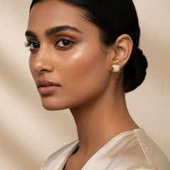 Woman wearing 925 Sterling Silver Gold Plated Studs