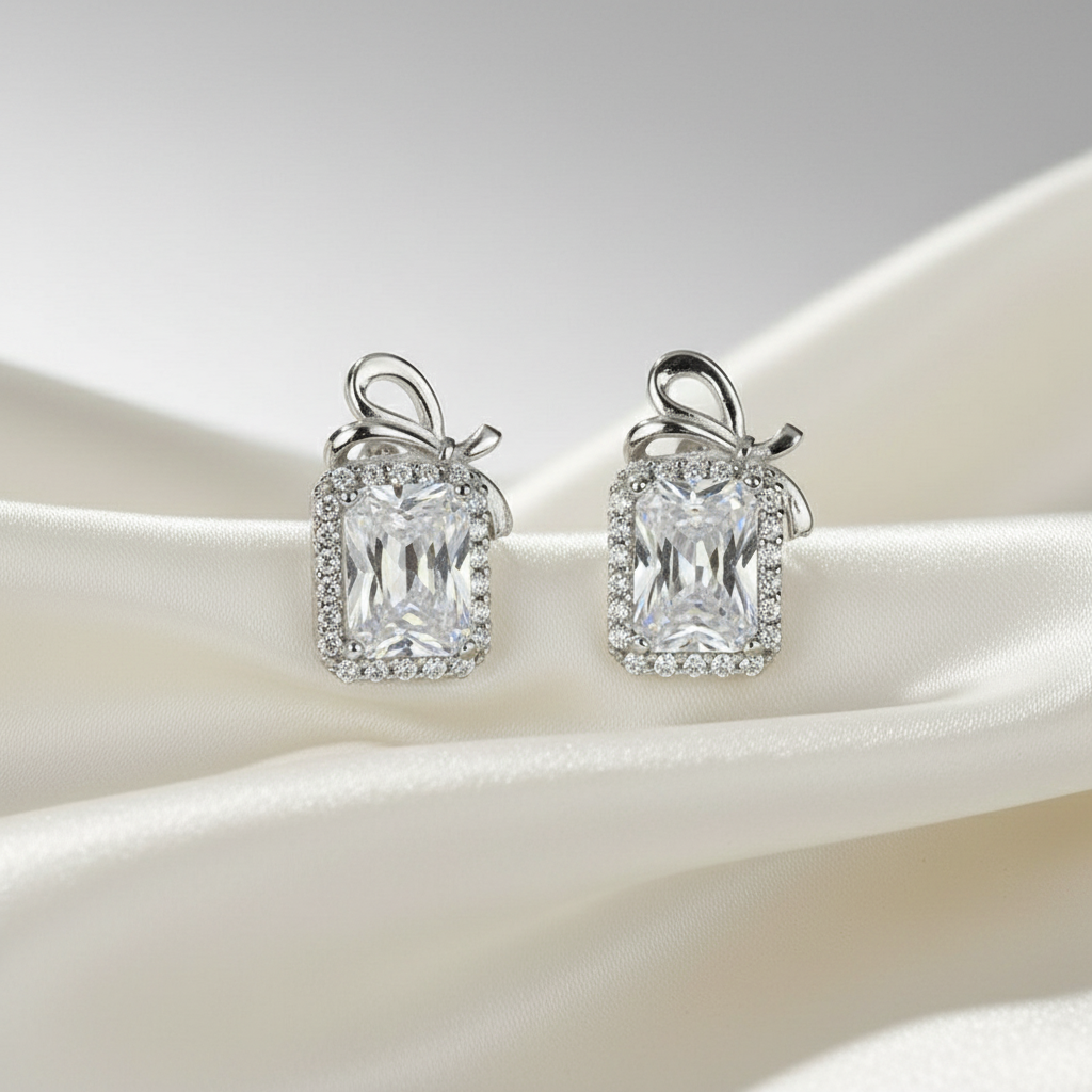 Pair of silver earrings with rectangular Solitaires 