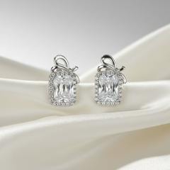 Pair of silver earrings with rectangular Solitaires 