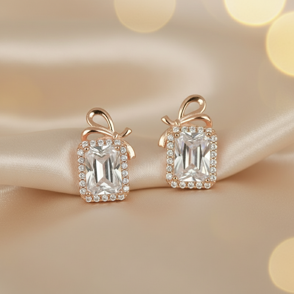 Pair of 925 Sterling Rosegold Bow Emerald Cut Studs