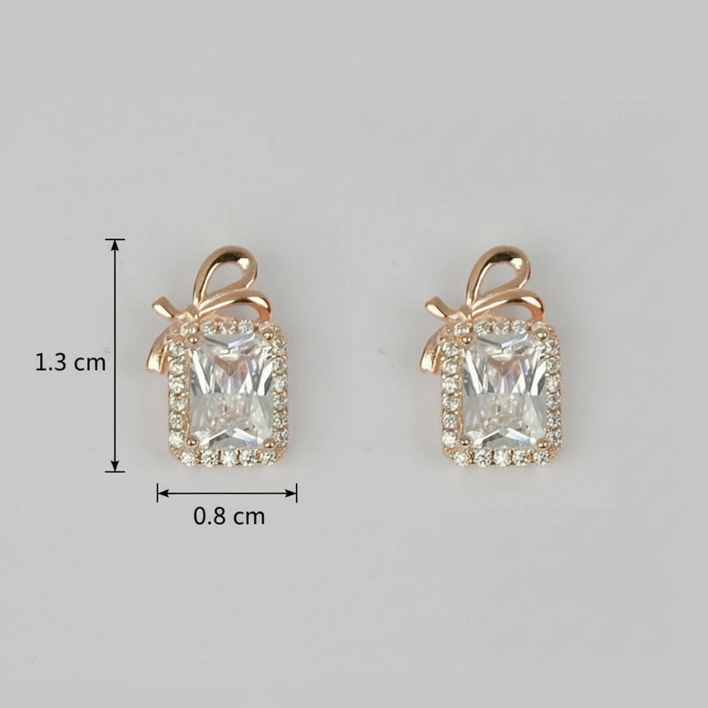 Pair of 925 Sterling Rosegold Bow Emerald Cut Studs