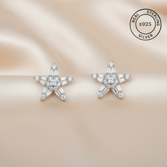 Star-shaped silver earrings with AAA+ cubic zircons , featuring 'Real Sterling Silver S925' label.