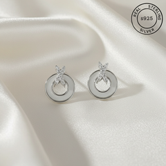 925 Sterling Silver Mother Of Pearl Studs with 'Real Sterling Silver' label.