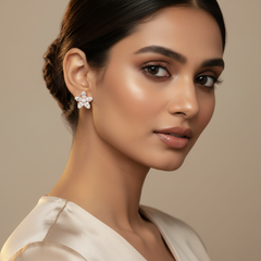 Woman wearing 925 Sterling Silver Rosegold Blossom Glow Studs