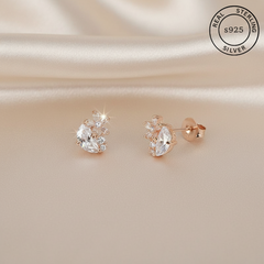 925 Sterling Silver Rosegold Celestial Spark Studs, featuring 'Real Sterling Silver' certification.