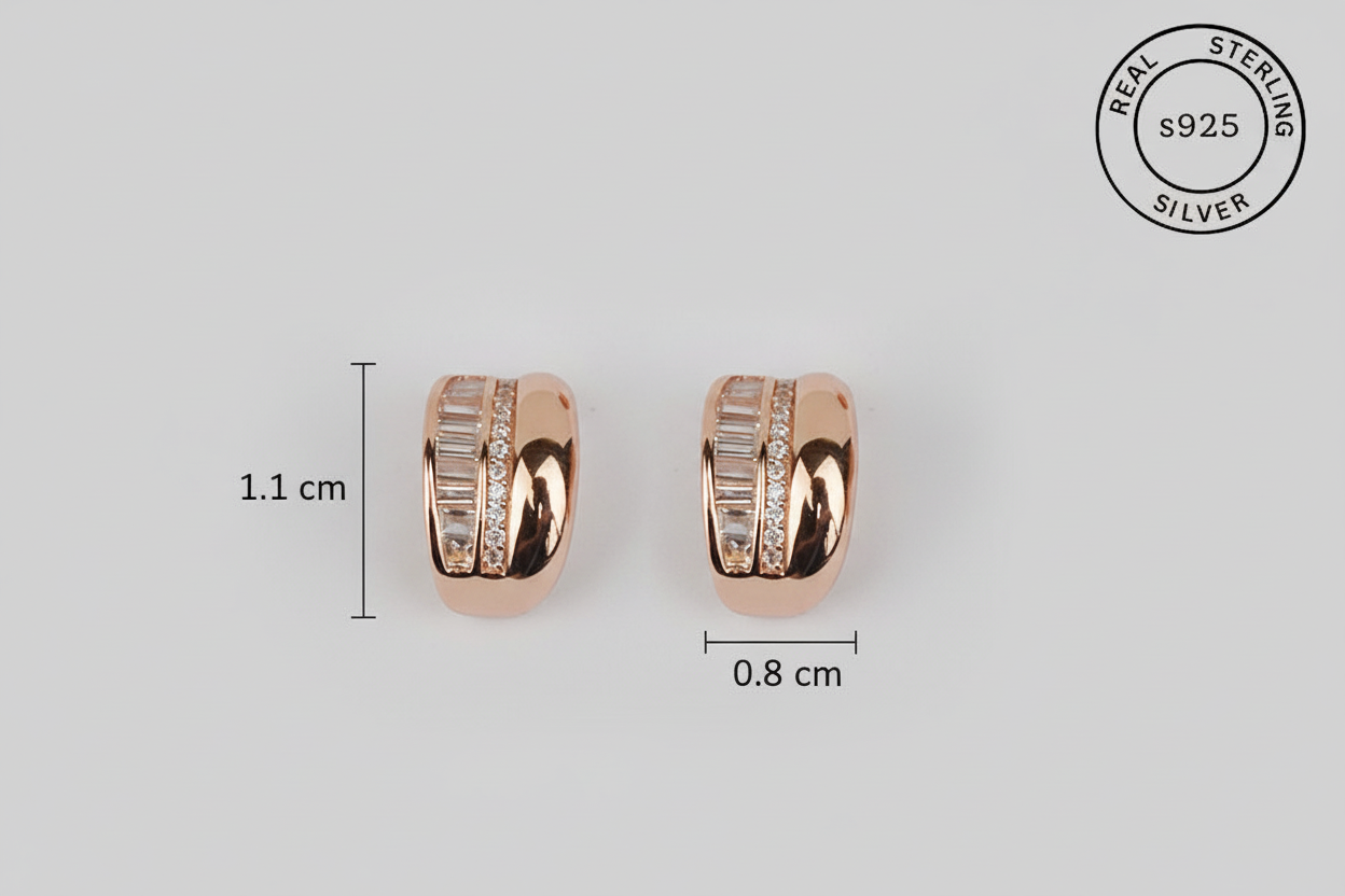 Rose gold earrings with zircon stones on a light gray background, showing measurements and 'Real Sterling Silver' certification.