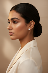 Woman wearing a white blazer with 925 Sterling Silver Rosegold Sparkle Studs