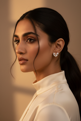 Woman wearing a white blouse with Rosegold 925 Sterling Silver Graceful Wings Studs