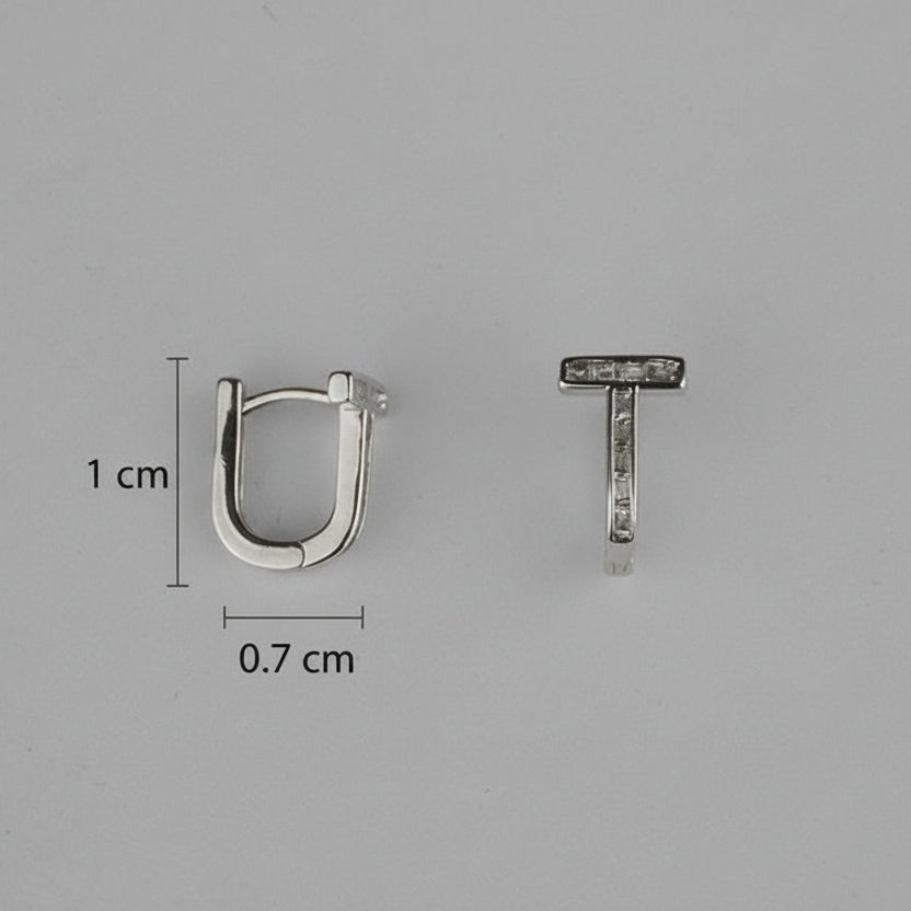 Two silver earrings, one U-shaped and one T-shaped, with measurements