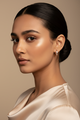 Woman wearing 925 Sterling Silver Rosegold Mini Hoops