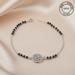 925 Sterling Silver Black Bead Halo Bracelet with black beads on a beige fabric background, featuring 'Real Sterling S925' label.