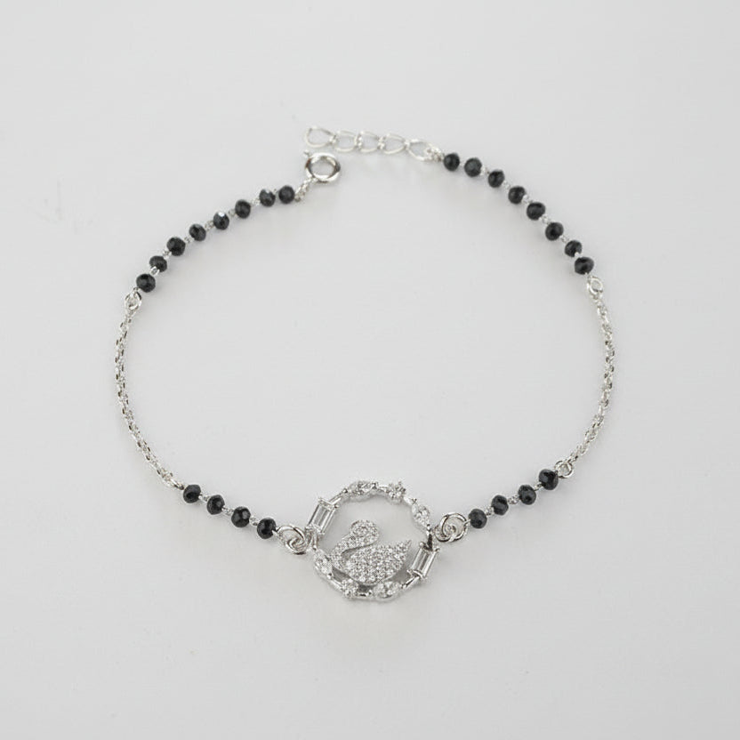 925 Sterling Silver Swan Black Bead Bracelet with black beads and silver clasp on a light gray background