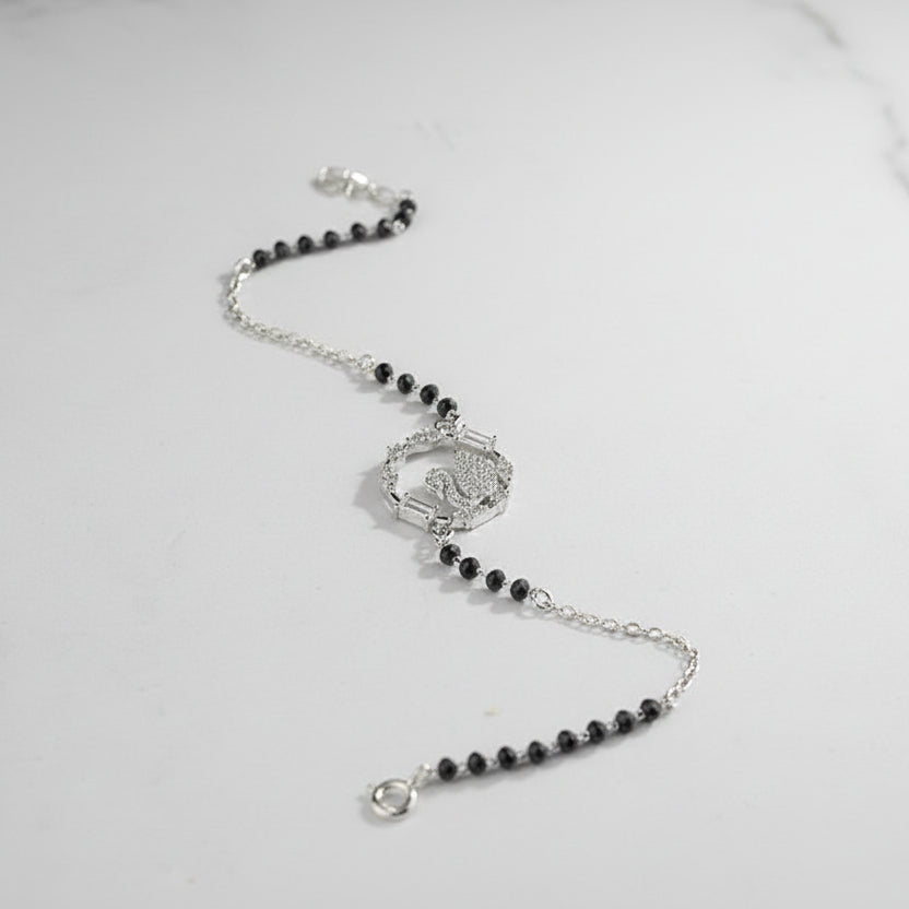 925 Sterling Silver Swan Black Bead Bracelet with silver clasp on a gray background