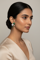 Woman wearing a pair of earrings 
