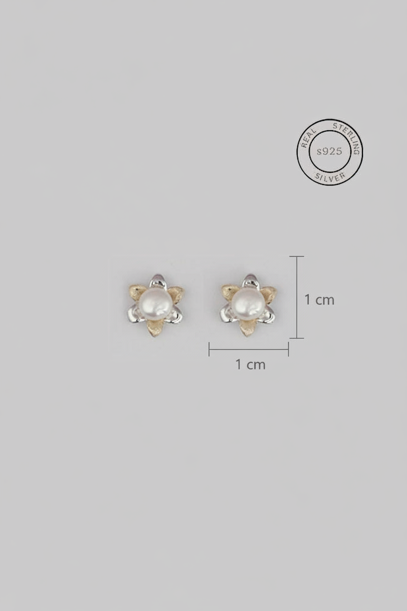 Pair of pearl stud earrings with gold accents on a gray background, accompanied by a measurement scale and '925 Sterling Silver' stamp.