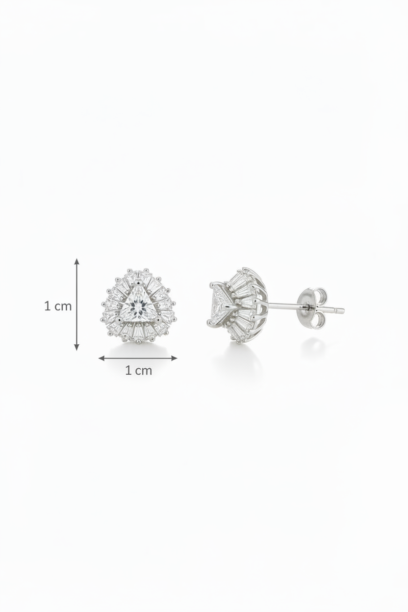 Pair of silver earrings with clear gemstones on a white background, shown with measurement scale.