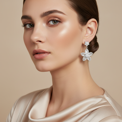 Woman wearing a pair Silver Bloom Radiant dangles