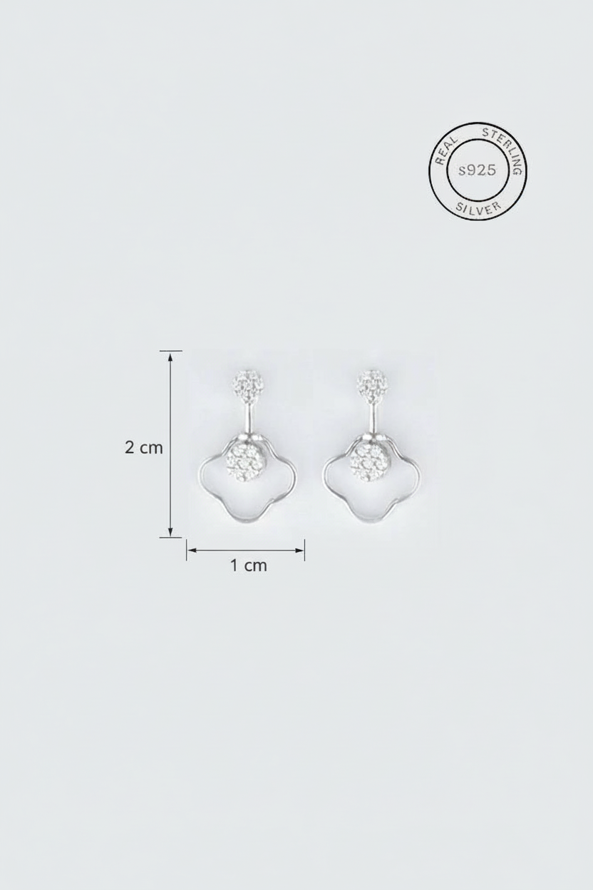 Silver earrings with clear gemstones on a light gray background, featuring a '925' stamp.