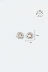 Pair of earrings with a measurement scale on a white background