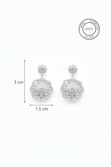 Silver earrings with measurement details on a white background