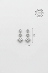 Silver earrings with clear stones and measurement details on a white background