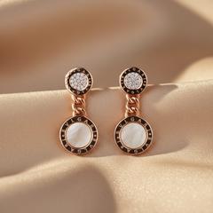 Rose gold earrings with mother of pearl stones