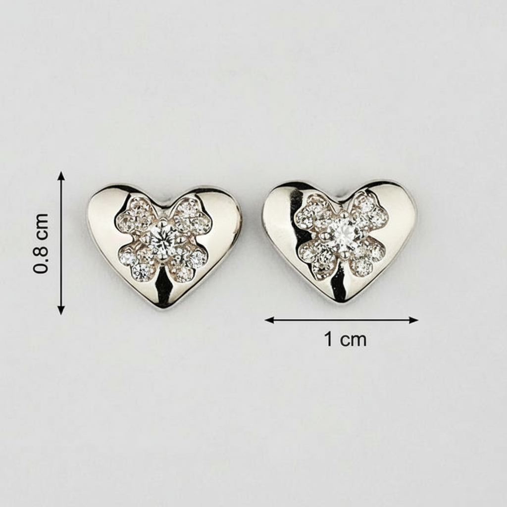 Heart-shaped earrings with floral designs and measurements on a white background