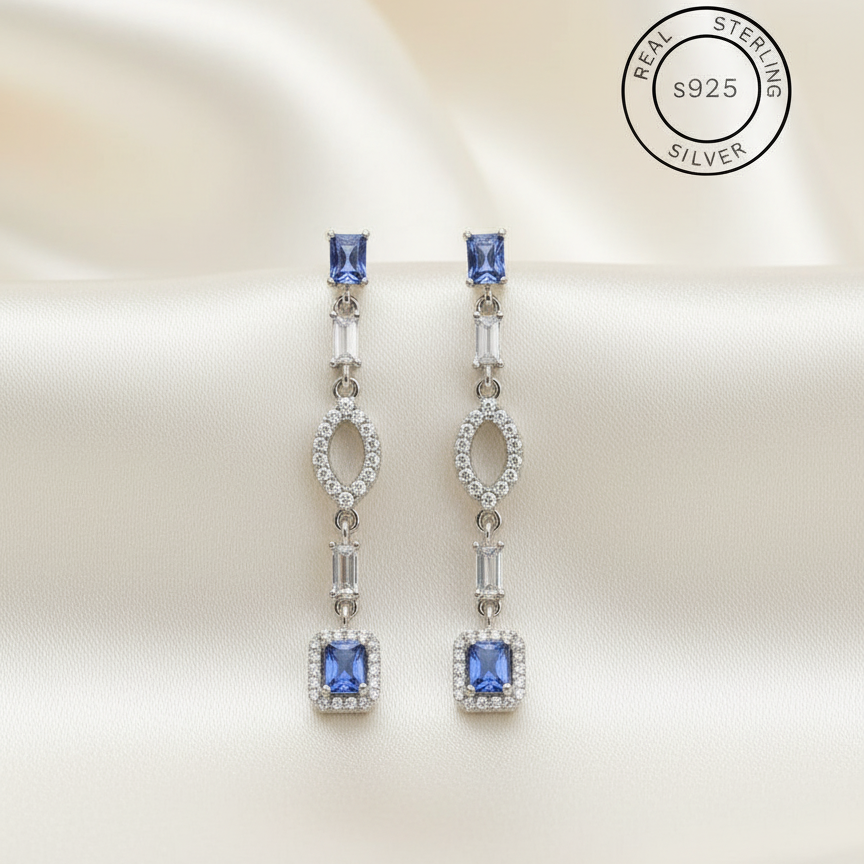 Pair of silver earrings with Silver Sapphire Blue Dangles