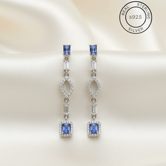 Pair of silver earrings with Silver Sapphire Blue Dangles